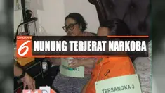 Komedian Nunung peragakan 40 adegan dalam rekonstruksi pembelian sabu hingga penghilangan barang bukti ketika digerebek.