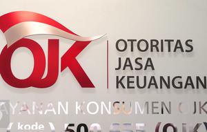 Tulisan OJK terpampang di Kantor Otoritas Jasa Keuangan (OJK), Jakarta. (Liputan6.com/Angga Yuniar)
