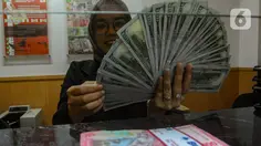 Rupiah Ditutup Nyaris Tembus 18.000 per Dolar AS, Sentimen Domestik Jadi Beban