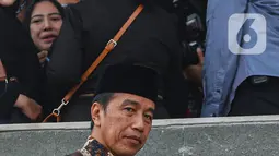 Presiden Jokowi tiba di rumah duka sekitar pukul 13.15 WIB. (Liputan6.com/Angga Yuniar)