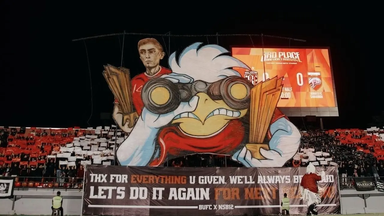 Koreo NSB12 dengan gambar sosok Fadil Sausu memegang trofi Liga 1