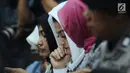 Istri Setya Novanto, Deisti Astriani Tagor saat mengikuti sidang lanjutan dugaan korupsi E-KTP di Pengadilan Tipikor, Jakarta, Rabu (20/12). Sidang beragendakan pembacaan eksepsi dakwaan oleh kuasa hukum. (Liputan6.com/Helmi Fithriansyah)