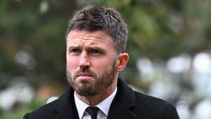 Semasa menjadi pemain, Michael Carrick bermain dalam 464 pertandingan bersama The Red Devils. Tampak dalam foto, Michael Carrick saat tiba di Katedral Manchester untuk menghadiri pemakaman pemenang Piala Dunia Inggris dan legenda Manchester United, Bobby Charlton, di Manchester, Inggris utara, pada 13 November 2023. (Paul ELLIS/AFP)