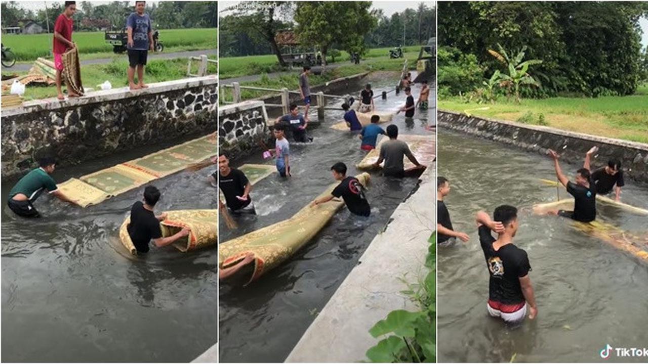 Sambut Bulan Ramadan, Ini Momen Seru Pemuda Nyuci Tikar Sambil Main Air