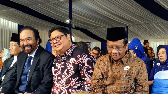 Ketua Umum Partai Golkar Airlangga Hartarto dan Mahfud MD hadiri ABN NasDem (Liputan6.com/ Putu Merta Surya Putra).