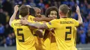 Para pemain Belgia merayakan gol yang dicetak Romelu Lukaku ke gawang Islandia pada laga UEFA Nations League di Stadion Laugardalsvollur, Selasa (11/9/2018). Belgia menang 3-0 atas Islandia. (AP/Brynjar Gunnarsson)