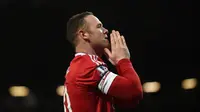 Ekspresi Wayne Rooney setelah Manchester United menang atas Stoke City 3-0 dalam lanjutan Liga Inggris di Stadion Old Trafford, Manchester, Rabu (3/2/2016) dini hari WIB. (AFP/Paul Ellis)