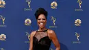 Aktris Insecure, Yvonne Orji memilih gaun hitam simpel namun tetap terlihat mewah dan sangat anggun. (FRAZER HARRISON / GETTY IMAGES NORTH AMERICA / AFP)