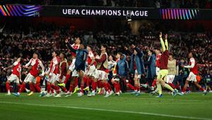 Pemain Arsenal merayakan keberhasilan melangkah ke final Liga Champions usai meraih kemenangan 1-0 atas Atletico Madrid pada leg kedua semifinal di Emirates Stadium, Rabu (6/5/2026) dini hari WIB. Arsenal lolos ke final dengan kemenangan agregat 2-1. (Adrian Dennis / AFP)