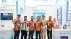 Direktur IT Digital Telkom Faizal Rochmad Djoemadi (ketiga dari kiri) bersama jajaran TelkomGroup di booth Telkom Solution dalam ajang Festival Ekonomi Keuangan Digital Indonesia (FEKDI) & Indonesia Fintech Summit & Expo (IFSE) 2026 di Jakarta International Convention Center (JICC), Jakarta. Melalui kolaborasi dengan Danantara Indonesia, Telkom Solution menghadirkan kapabilitas dan solusi digital terintegrasi untuk mendukung penguatan ekosistem ekonomi dan keuangan digital Indonesia yang semakin inklusif, aman, dan berdaya saing.