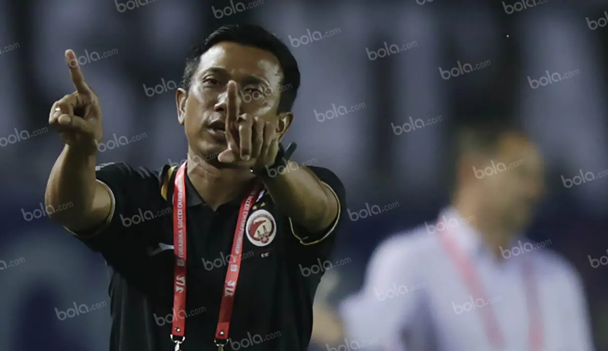 Pelatih Sriwijaya FC, Widodo Cahyono Putro, saat bertanding melawan Persib dalam laga Torabika Soccer Championship 2016 di Stadion Si Jalak Harupat, Bandung, Sabtu (30/4/2016). (Bola.com/Vitalis Yogi Trisna)
