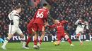 Pemain Manchester United, Amad Diallo mencetak gol ke gawang Liverpool pada laga lanjutan Liga Inggris 2024/2025 di Anfiled, Liverpool, Inggris, Minggu (05/01/2025). (AFP/Darren Staples)