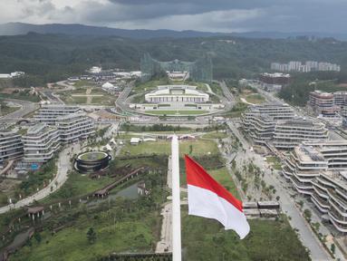 Foto udara yang diambil pada 14 Agustus 2025 ini menunjukkan Istana Kepresidenan dan gedung-gedung kementerian pemerintah yang sedang dalam tahap pembangunan di Ibu Kota Nusantara (IKN), ibu kota baru Indonesia yang direncanakan, di Kalimantan Timur. (Foto oleh AFP)