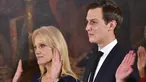 Penasihat Presiden, Kelleyanne Conway (kiri) dan Penasihat Senior Presiden yang juga menantu Presiden AS Donald Trump, Jared Kushner mengambil sumpah dalam pelantikan di Ruang Timur Gedung Putih, Washington, Minggu (22/1). (AFP PHOTO/Mandel NGAN)