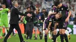 Bermain di stadion Santiago Bernabeu, Bayern Munchen harus menelan pil pahit kekalahan 1-2 dari Real Madrid. (JAVIER SORIANO/AFP)
