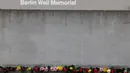 Jerman memperingati 34 tahun runtuhnya Tembok Berlin. (Odd ANDERSEN/AFP)