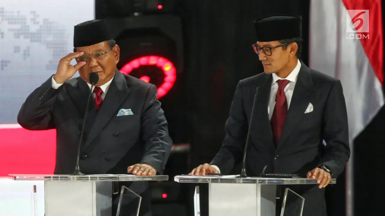 Ekspresi Prabowo - Sandiaga Uno Saat Debat Kelima Pilpres 2019