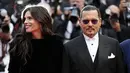 <p>Johnny Depp akhirnya perdana muncul di Festival Film Cannes 2023 usai berseteru dengan Amber Heard. (Photo by Scott Garfitt/Invision/AP)</p>