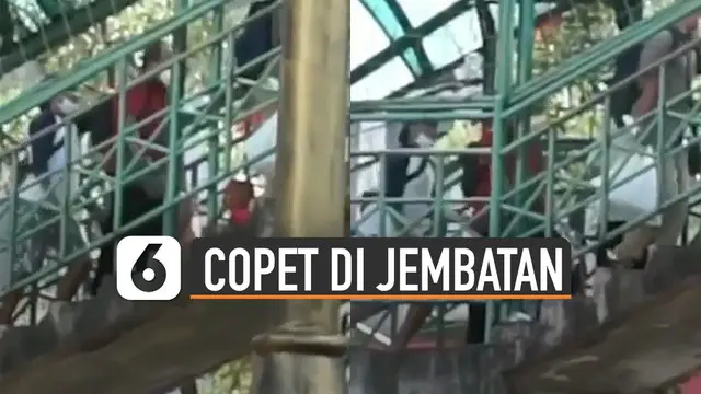 Beredar video aksi copet di jembatan penyeberangan viral di media sosial.