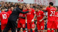 Penampilan perdana manajer anyar Liverpool, Jurgen Klopp, setelah menggantikan posisi Brendan Rodgers hanya bisa bermain imbang saat bertandang ke kandang Tottenham Hotspur dalam lanjutan Liga Inggris, (17/10/2015). (AFP/Ian Kington).
