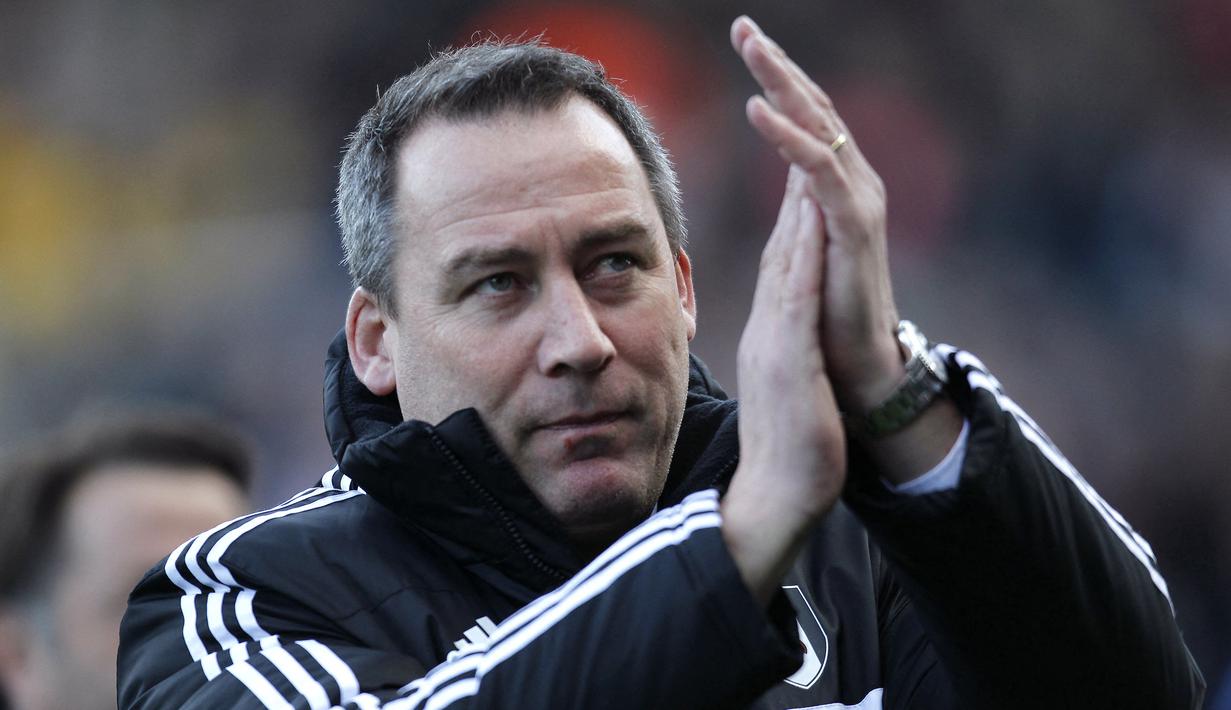 Rene Meulensteen. Pelatih berusia 58 tahun yang kini menjadi asisten pelatih Timnas Australia sejak 2018 ini pernah menjadi asisten Alex Ferguson di Manchester United mulai 2008 hingga 2013. Lepas dari MU ia pun sempat membesut Fulham mulai November 2013 hingga Februari 2014. (AFP/Ian Kington)