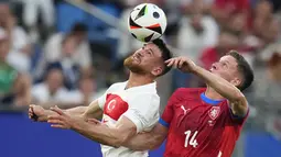 Timnas Turki sukses mengamankan tiga poin usai menang 2-1 melawan Republik Ceko. (AP Photo/Petr David Josek)