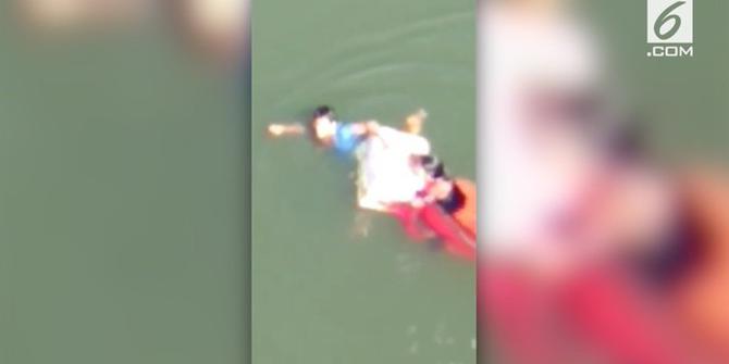 VIDEO: Pria Gagalkan Aksi Bunuh Diri dengan Lompat dari Jembatan