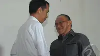 Jokowi dan Aburizal Bakrie (Liputan6.com/Herman Zakharia)