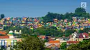 Pemandangan Kampung Wonosari di Randusari, Semarang (24/5). Karena banyaknya warna, kampung tersebut sekarang lebih dikenal sebagai Kampung Pelangi. (Liputan6.com/Gholib)