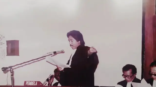 Gaya berpakaian Hotma Sitompul (sumber Liputan6.com)