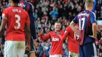Wayne Rooney menjadi pusat perhatian ketika MU berhasil mengalahkan Stoke City dengan skor 4-2 di Old Trafford pada 2012.  Dalam pertandingan tersebut Rooney mencetak dua gol pada menit ke-27 dan ke-65. Rooney juga memberikan asisst kepada Danny Welbeck. (AFP/Andrew Yates)