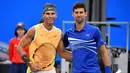 Pertemuan Rafael Nadal dan Novac Djokovic pada semifinal French Open 2021 dijadwalkan akan digelar pada hari Jumat waktu setempat. Pertandingan ini menjadi salah satu yang ditunggu oleh para pectinta olahraga tenis dunia. (Foto: AFP/Saeed Khan)