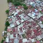 Luapan sungai Bone menerjang Kelurahan Bugis dan Talumolo Kota Gorontalo (Arfandi Ibrahim/Liputan6.com)