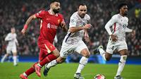Hingga akhir pertandingan skor 2-1 untuk Liverpool tidak berubah. Kemenangan atas Lille LOSC memperkokoh posisi Liverpool di puncak klasemen Liga Champions 2024/2025 dengan 21 poin dari 7 pertandingan. (Paul ELLIS/AFP)