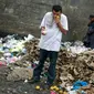 Warga Venezuela terpaksa makan dari tumpukan sampah demi bisa bertahan hidup di tengah krisis ekonomi (Reuters)