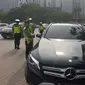 Sebanyak 125 mobil mewah terjaring razia di kawasan elite Pantai Indah Kapuk, Jakarta Utara. (Liputan6.com/Moch Harun Syah)