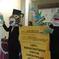 Pasangan capres dari Greenpeace, Raung dan Umba di Kantor KPU Jakarta (Hanz Jimenez Salim/Liputan6.com)