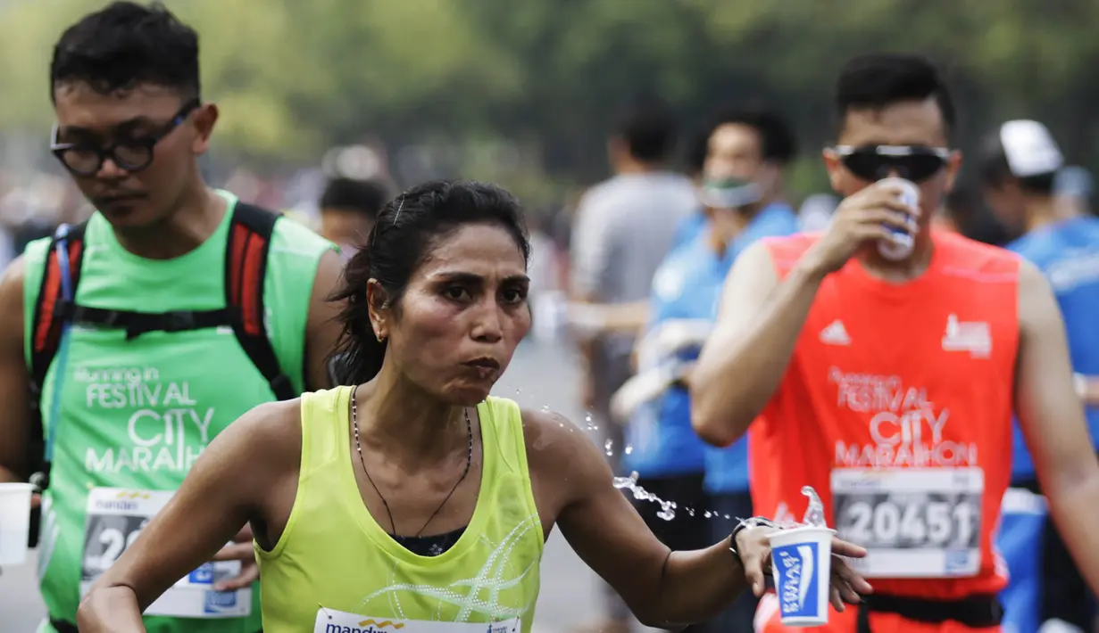 Beberapa atlet nasional juga turut ambil bagian pada Mandiri Jakarta Marathon. (Bola.com/Vitalis Yogi Trisna)