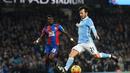 Gelandang energik Manchester City, David Silva telah mengoleksi 8 assists hingga pekan ke-25 Liga Premier Inggris. (AFP/Paul Ellis)