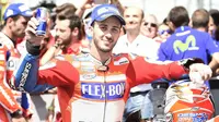 Pebalap Ducati, Andrea Dovizioso, enggan sesumbar terkait peluang menjadi juara dunia MotoGP 2017 meski baru saja memenangi balapan MotoGP Italia di Sirkuit Mugello, Minggu (4/6/2017). (Motorsport)