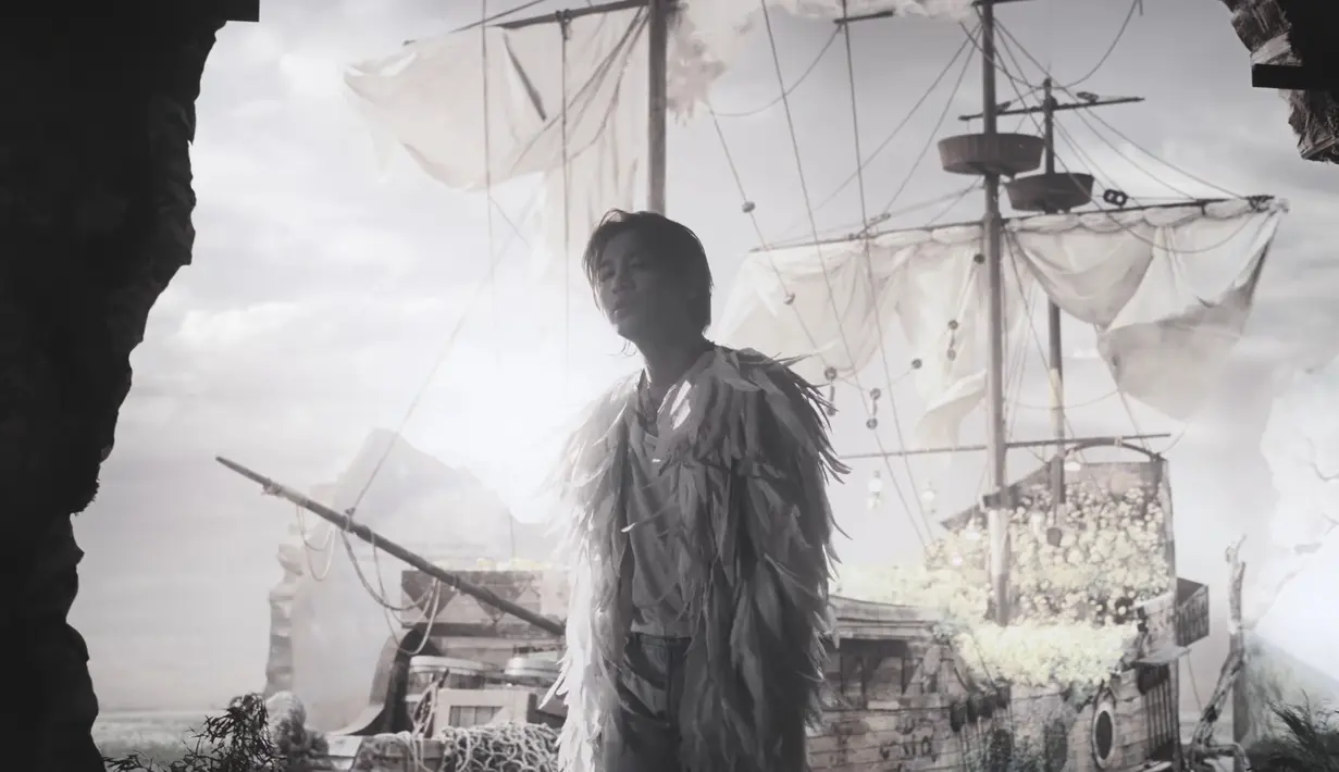 Taeyang muncul dengan rambut agak lebih panjang dan rapi. Gayanya terlihat seperti pemeran utama drama Jepang. (YouTube BigBang)