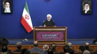 Presiden Iran Hassan Rouhani dalam konferensi pers di Teheran hari Minggu (16/2). (Source: AP)