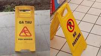 Potret penanda lantai licin (sumber: 1cak.com)