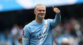 Penyerang Manchester City, Erling Haaland girang bukan kepalang usai membawa timnya mengalahkan Liverpool di perempat final FA Cup di Etihad Stadium, Sabtu (4/4/2026). (AFP/Darren Staples)