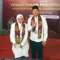 Tri Rismaharini mendaftarkan diri sebagai calon gubernur di kantor KPU Jatim di Surabaya, Kamis malam (29/8/2024). (Liputan6.com/Dian Kurniawan)