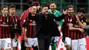 Pelatih AC Milan, Gennaro Gattuso merayakan kemenangan usai mengalahkan Sampdoria 1-0 pada lanjutan Liga Serie A Italia di stadion San Siro (18/2). Il Diavolo Rosso belum terkalahkan dalam 10 laga terakhir di berbagai ajang. (AFP Photo/Miguel Medina)