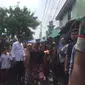 Calon presiden Joko Widodo (Jokowi) tiba di Kampung Deret Tanah Tinggi, Jakarta Pusat pada pukul 12.30 WIB.