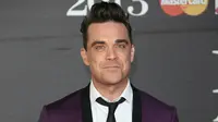 Robbie Williams Torehkan Sejarah di Dunia Musik Inggris