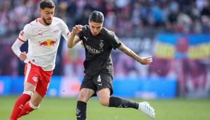 Bek Timnas Indonesia, Kevin Diks, tampil bersama Borussia Monchengladbach saat bersua RB Leipzig pada laga pekan ke-29 Bundesliga 2025/2026 di Stadion Red Bull Arena, Minggu (12/4/2026) dini hari WIB. Sayangnya dalam duel tersebut Monchengladbach kalah 0-1 dari Leipzig. (AFP/Ronny HARTMANN)