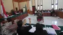 Suasana persidangan saat Arist Merdeka Sirait menjadi saksi dalam persidangan kasus pembunuhan Angeline di Pengadilan Negeri Denpasar, (12/1). Ia didatangkan untuk mengungkap kronologi pertemuan dengan terdakwa Margriet Megawe. (Liputan6.com/Angga Yuniar)